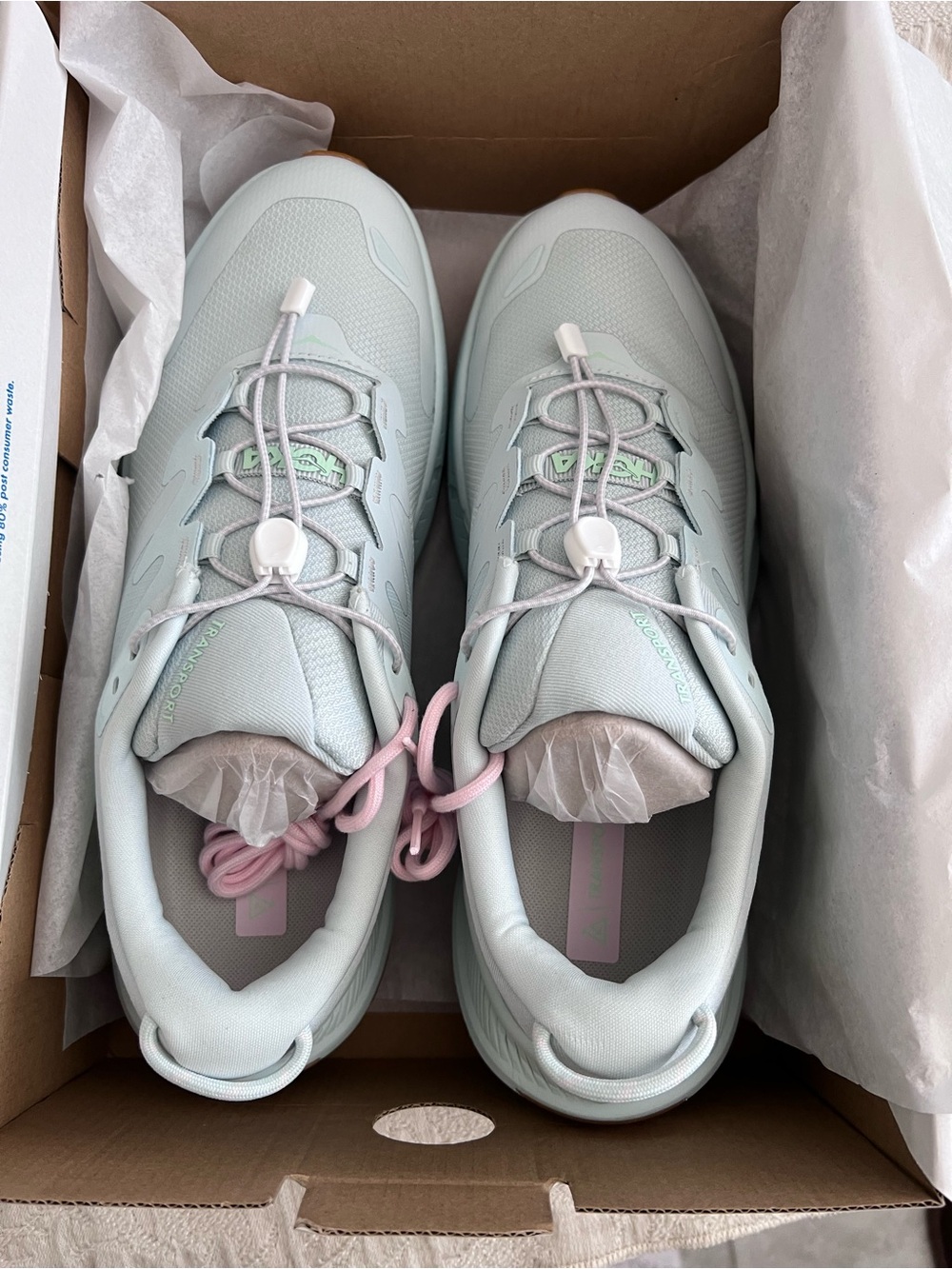 Hoka Transport sneaker light blue-green with droplet collar. Toggle lacing NIB